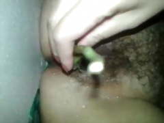 Hot Indian wife Binitha taking veggie in her pussy